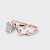 Rose gold Oval Cut Solitaire Diamond with Side Stones on Criss-Cross Band and Four-Prong Setting