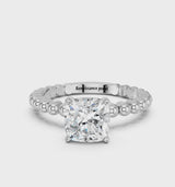 Platinum Cushion Cut Diamond Solitaire Ring with Beaded Band and Prong Setting