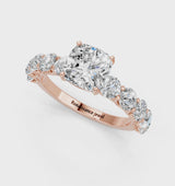 Rose gold Cushion Cut Diamond Prong Setting with Side Stones on a Pave Band