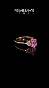 Rose gold Pear Cut Pink Sapphire Ring with Side Stones and Four-Prong Setting