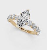 Yellow gold Marquise Cut Diamond Prong Setting with Side Stones on a Pave Band