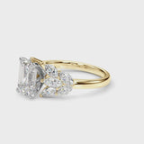 Yellow gold Emerald Diamond Cluster Leaf Design Ring with Prong Setting