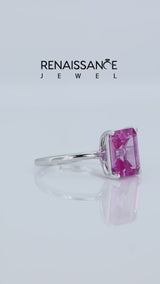 Silver Emerald Cut Pink Sapphire Solitaire Engagement Ring with Round Band and Four-Prong Setting