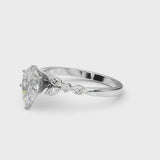 Silver Pear Cut Diamond Solitaire Ring with Side Stones and Four-Prong Setting