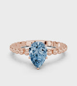 Rose gold Fancy Blue Pear Cut Diamond Solitaire Ring with Beaded Band and Prong Setting