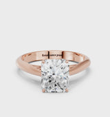 Rose gold Radiant Cut Diamond Solitaire Engagement Ring with Cathedral Setting and Four-Prong Mount