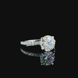 White gold Marquise Cut Diamond Brilliant Solitaire Ring with Pavé Band and Four-Prong Setting
