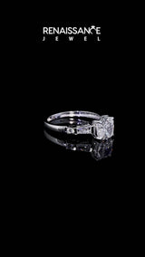 White gold Cushion Cut Diamond Ring with Baguette Side Stones, Channel Set Band, and Four-Prong Setting