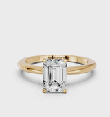 Yellow gold Emerald Cut Diamond Solitaire Ring with Six-Prong Setting and Classic Band
