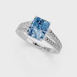 White gold Fancy Blue Radiant Cut Diamond Solitaire Engagement Ring with Split Shank Pavé Band