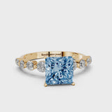 Yellow gold Fancy Blue Princess Cut Solitaire Diamond Ring with Pave Band and Four-Prong Setting