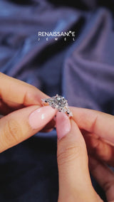 White gold Round Cut Diamond Solitaire Ring with Side Stones and Four-Prong Setting