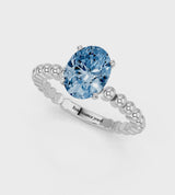 Silver Fancy Blue Oval Cut Diamond Solitaire Ring with Beaded Band and Prong Setting