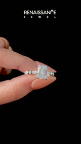 White gold Emerald Cut Diamond Ring with Marquise and Round  Side Stones and Four-Prong Setting