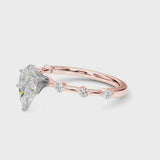 Rose gold Pear Solitaire Diamond Ring with Bezel Set Side Stones and Prong Setting