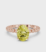 Rose gold Fancy Yellow Oval Cut Diamond Solitaire Ring with Beaded Band and Prong Setting