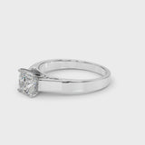 Platinum Cushion Solitaire Engagement Ring with Four-Prong Setting and Tapered Band