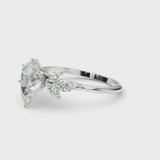 Silver Pear Diamond Floral Cluster Ring with Marquise Side Stones and Six-Prong Solitaire Setting