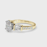 Yellow gold Oval Cut Diamond Engagement Ring with Baguette Side Stones and Channel Set Band