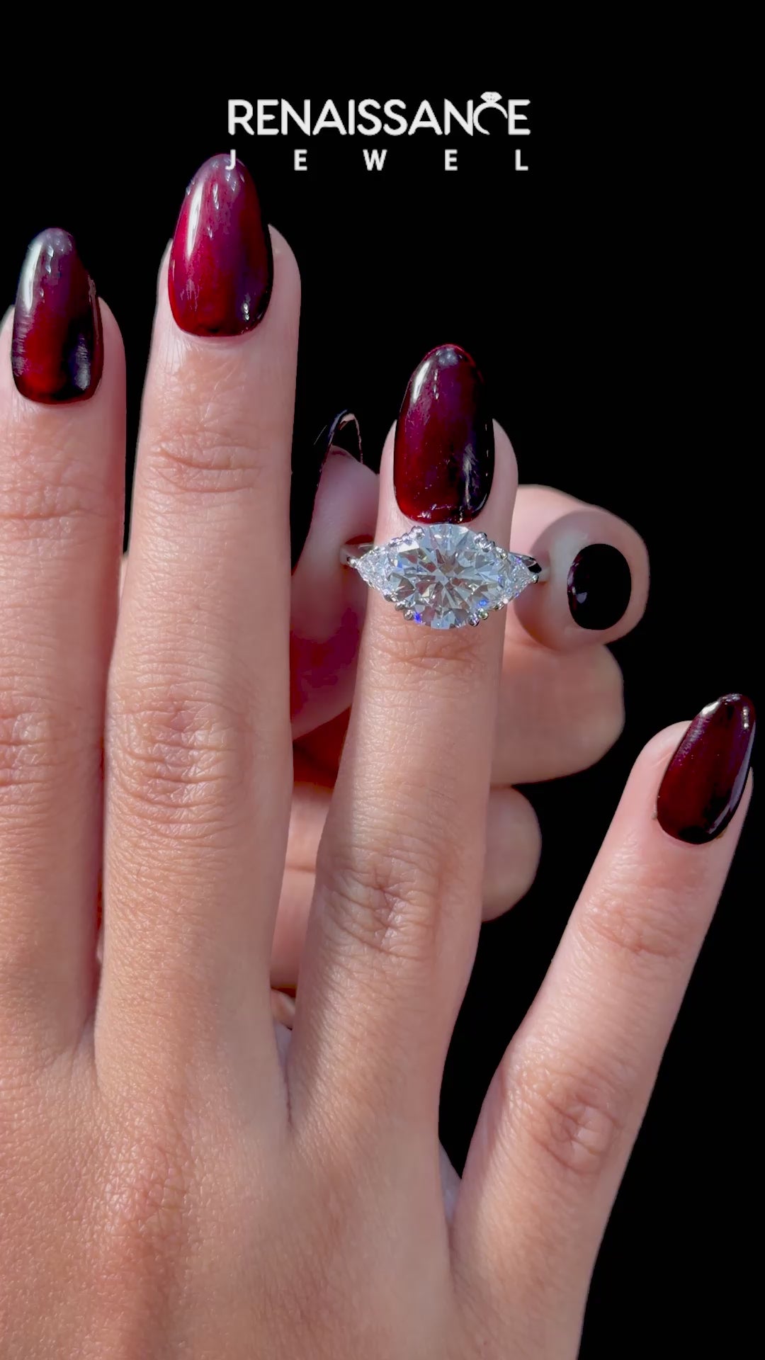 Platinum Round Brilliant and Trilliant Diamond Three-Stone Ring_76