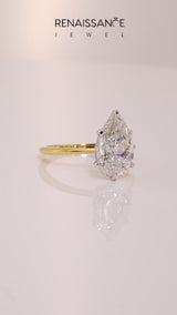 Yellow gold Pear Cut Diamond Solitaire Engagement Ring with Classic Band and Four-Prong Setting