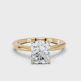 Yellow gold Radiant Cut Diamond Solitaire Ring with Six-Prong Setting and Classic Band