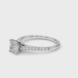 Silver Cushion Cut Solitaire Diamond Ring with Pave Band and Four-Prong Setting
