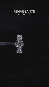 Platinum Three-Stone Round Cut Diamond Engagement Ring with Flat Band and Four-Prong Setting