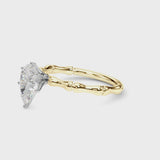 Yellow gold Pear Solitaire Diamond Ring with Bamboo Band and Four-Prong Setting