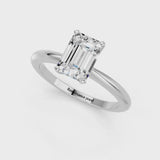 White gold Emerald Cut Diamond Solitaire Ring with Six-Prong Setting and Classic Band