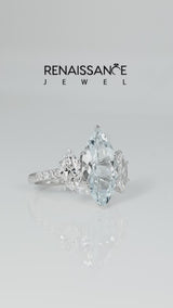 Silver Three-Stone Marquise Cut Aquamarine Ring with Round  Pavé Band and Prong Setting