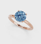 Rose gold Fancy Blue Round Cut Diamond Solitaire Ring with Six-Prong Setting and Classic Band