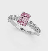 White gold Fancy Pink Emerald Cut Diamond Prong Setting with Side Stones on a Pave Band