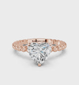 Rose gold Heart Cut Diamond Solitaire Ring with Beaded Band and Prong Setting