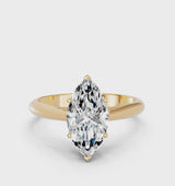 Yellow gold Marquise Cut Diamond Solitaire Engagement Ring with Cathedral Setting and Four-Prong Mount