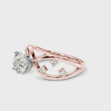 Rose gold Round Cut Solitaire Diamond with Side Stones on Criss-Cross Band and Four-Prong Setting