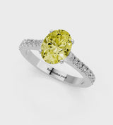 White gold Fancy Yellow Oval  Cut Solitaire Diamond Engagement Ring with Pave Band and Four-Prong Setting