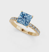 Yellow gold Fancy Blue Princess Cut Diamond Solitaire Pavé Band with Four-Prong Setting
