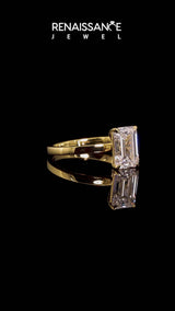 Yellow gold Emerald Solitaire Engagement Ring with Cathedral Band and Four-Prong Setting