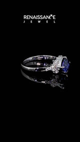 Silver Cushion Cut Tanzanite Ring with Side Stones and Four-Prong Setting
