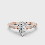 Rose gold Pear Cut Channel Set Solitaire Engagement Ring with Four-Prong Setting