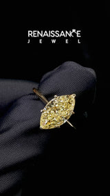 Yellow gold Fancy Yellow Marquise Cut Diamond Solitaire Engagement Ring with Classic Band and Four-Prong Setting