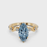 Yellow gold Fancy Blue Marquise  Solitaire Twisted Band with Prong Setting