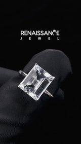 Silver Emerald Cut Aquamarine Solitaire Engagement Ring with Round Band and Four-Prong Setting