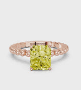 Rose gold Fancy Yellow Radiant Cut Diamond Solitaire Ring with Beaded Band and Prong Setting