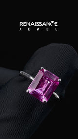 Silver Emerald Cut Pink Sapphire Solitaire Engagement Ring with Round Band and Four-Prong Setting