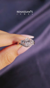 White gold Three-Stone Oval Diamond Ring with Round Side Stones, Classic Band, and Four-Prong Setting