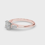 Rose gold Oval Solitaire with Tapered Baguette Side Stones on a Classic Band with Four-Prong Setting