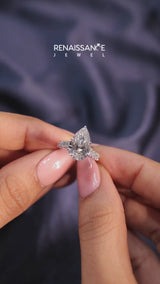Platinum Pear Cut Diamond Classic Solitaire Ring with Pavé Band and Four-Prong Setting