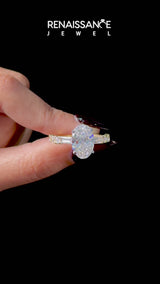Yellow gold Oval Cut Diamond Solitaire with Side Baguettes and Channel Set Band